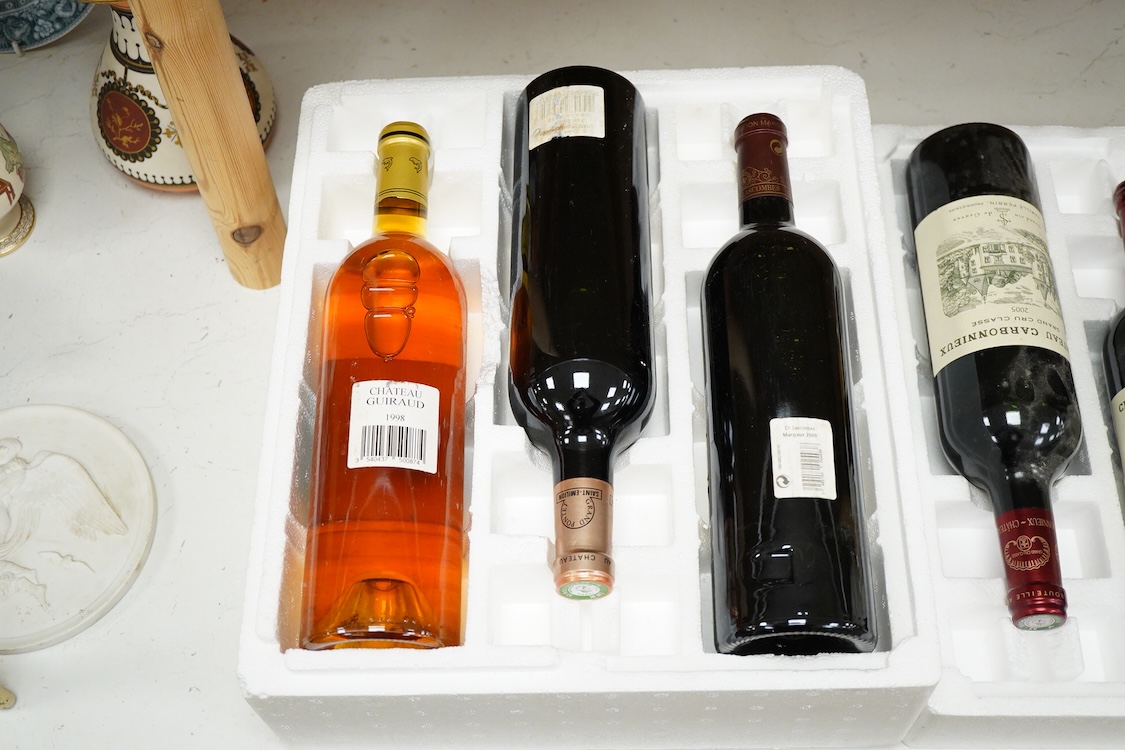 Six bottles of mixed wines, including a bottle of Margaux, Chateau-Lascombes grand cru 2000, a bottle of Larrivet Haut Brion, 2010, two bottles of Chateau Carbonnieux grand cru 2005, a bottle Chateau Grand- Pontet grand